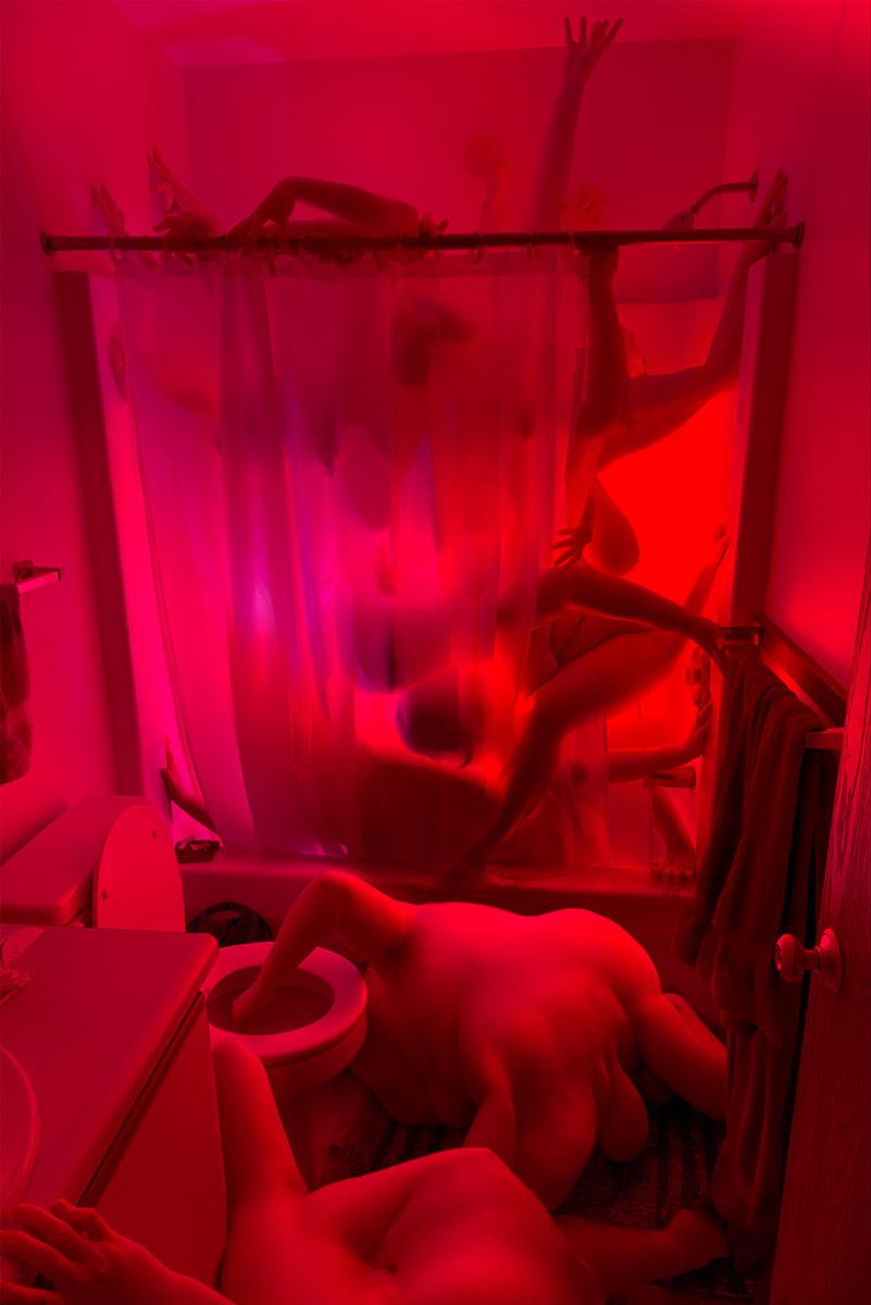 Composite image of  several morphed human bodies in a bathroom using vibrant colors